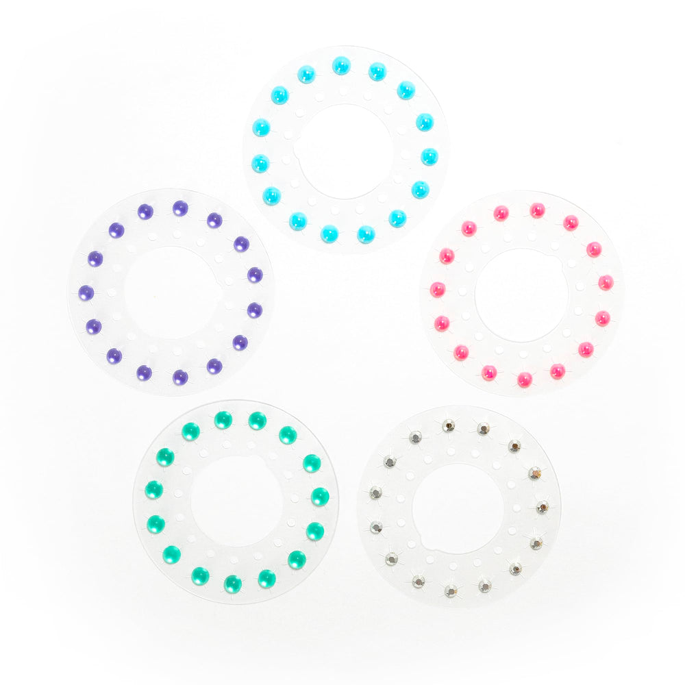 Blinger glitter gems add dimension to hair braids and fashion accessories.