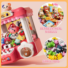 Prize display shows plush toys and hanging rings inside the machine.