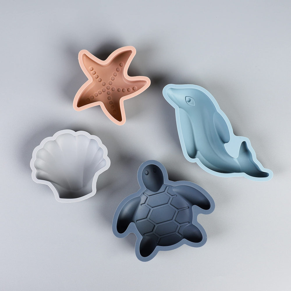 Blue Ginkgo sea turtle mold fuels ocean-themed sandbox adventures.