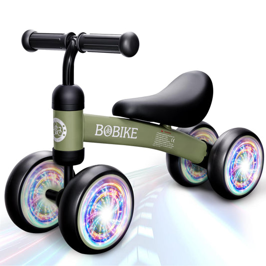 Bobike baby balance bike in colorful deep green helps early balance exploration.
