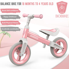 Bobike Toddler Balance Bike pink side view shows kid-friendly outdoor exploration