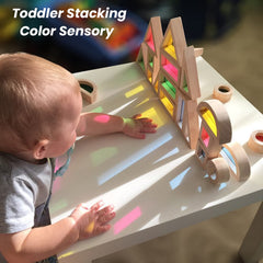 BOHS Rainbow Blocks on a window creating decorative light play and learning moments.