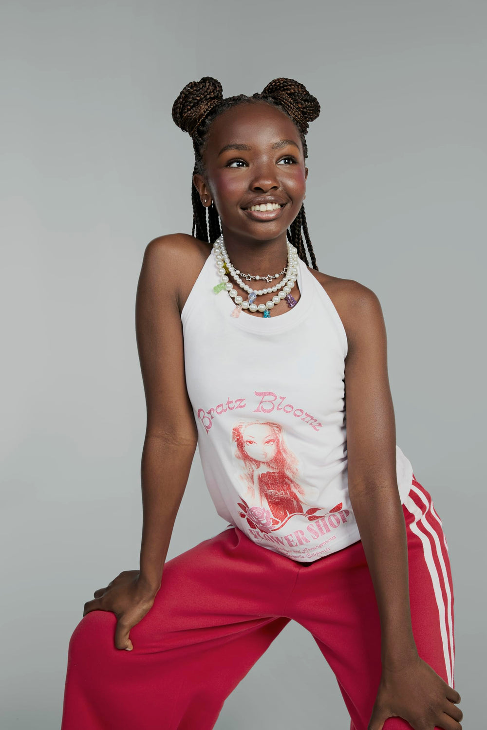 Included brush helps maintain long glossy hair.