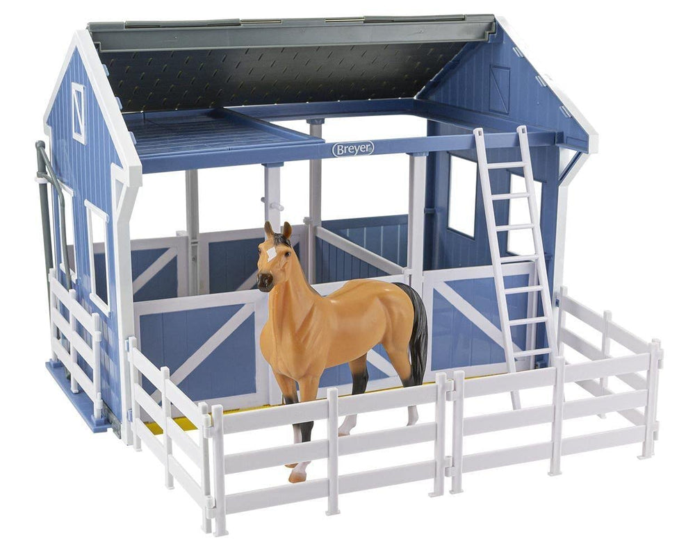 Breyer Freedom Series Deluxe Stable with wash stall and Buckskin Quarter Horse for imaginative play.