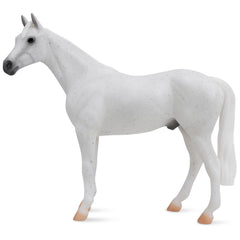 Breyer Freedom Series Fleabitten Grey Thoroughbred figure with hand-painted detail for realistic play and display