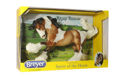 Breyer Gypsy Vanner with detailed sculpting highlights mane and tail for lifelike charm.