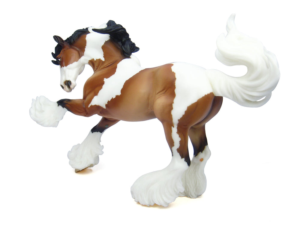 Breyer Gypsy Vanner hand-painted coat captures depth and texture for shelf display.