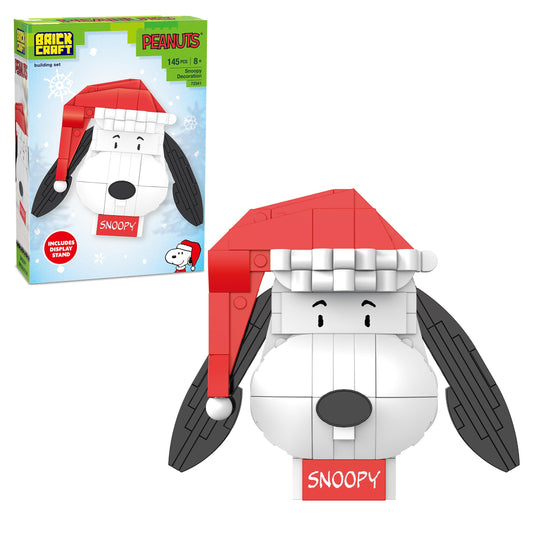 Brickcraft Snoopy Christmas figure on display stand for festive decor.