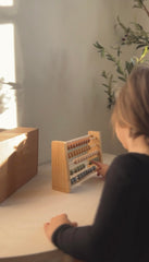 Brooklyn Neutral Boho Abacus decorative toy that doubles as learning aid.