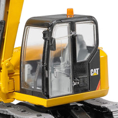 Bruder Cat mini excavator stabilizing blade helps leveling on soft ground