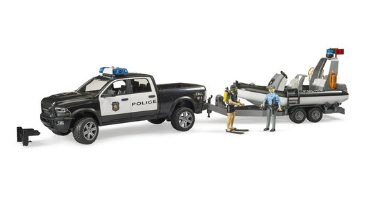 Bruder RAM 2500 police pickup with roof light and sound module for authentic emergency play.