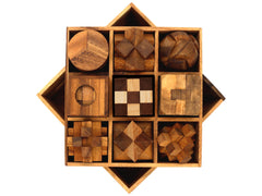 BSIRI wooden brain teaser hand placing pieces during puzzle solving