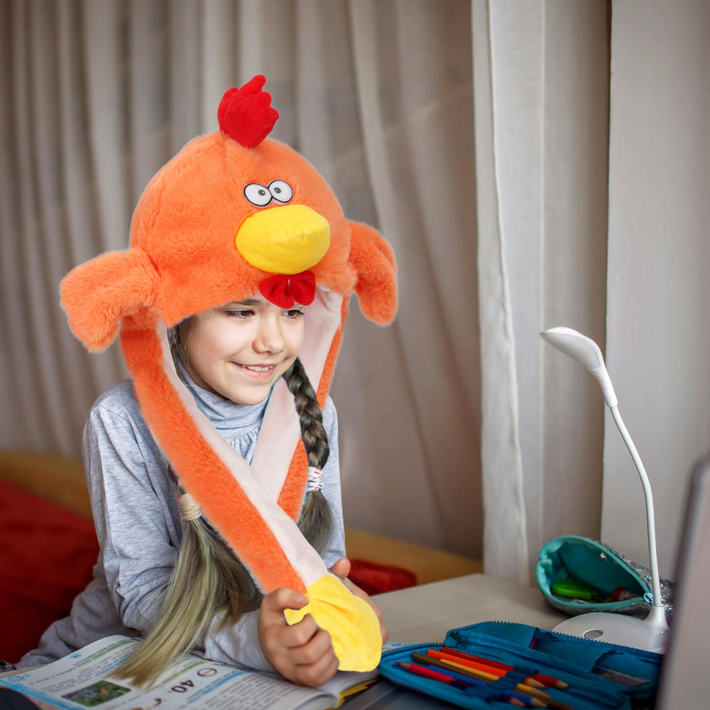 Bubblepompom orange chicken hat in plush material, perfect for autumn and winter wear