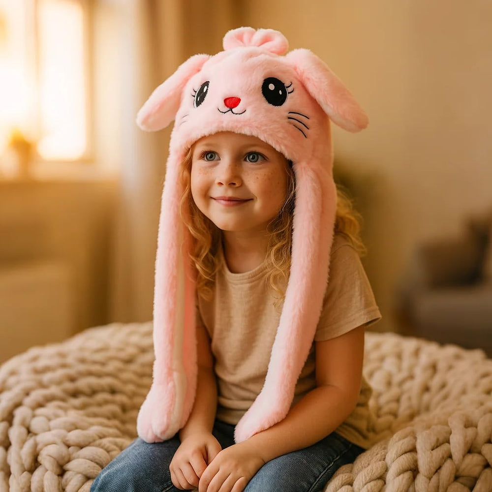 Bubblepompom Kitty Hat pink plush keeps kids warm while posing.