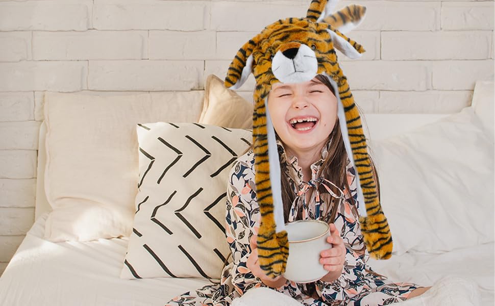Bubblepompom tiger hat at a party captures playful, festive moments.