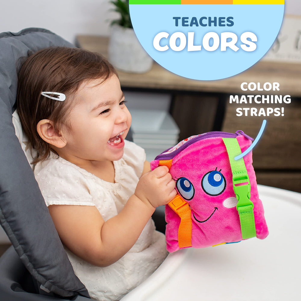 Buckle Toys Bella Square includes a zipper pocket to store small travel essentials