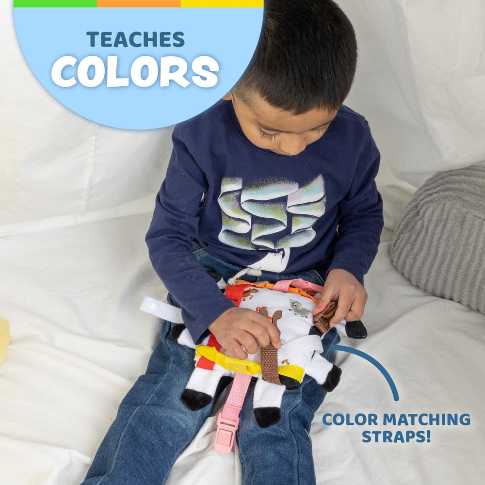 Bessie Cow travel-clip keeps toy within reach during trips.