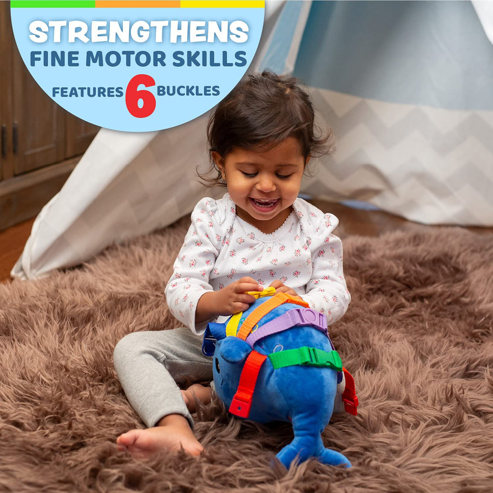 Blu Whale's zipper pocket invites interactive play and fine motor exploration on the go.
