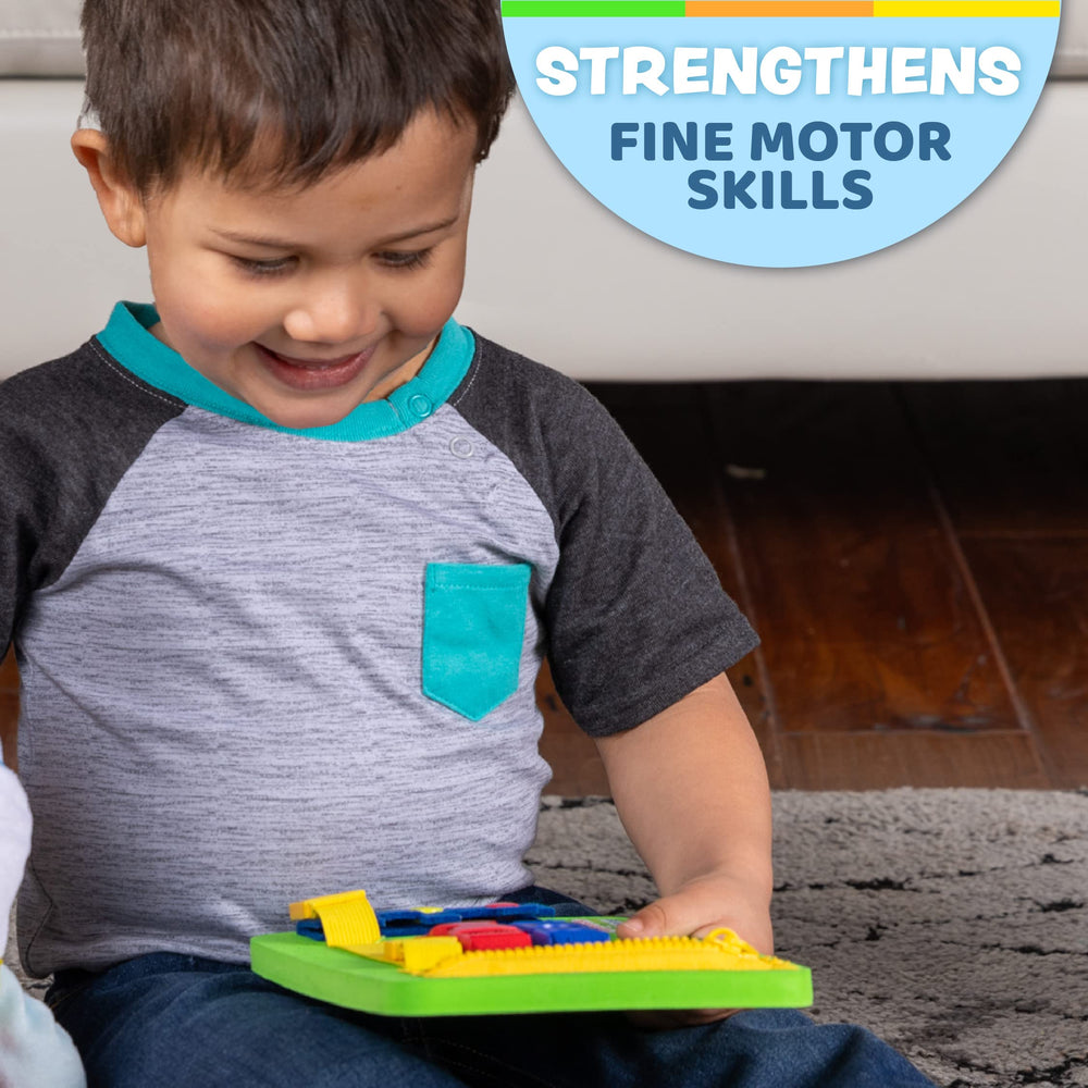 Buckle Toys mini busy board shows snap buttons for fine motor skill practice.