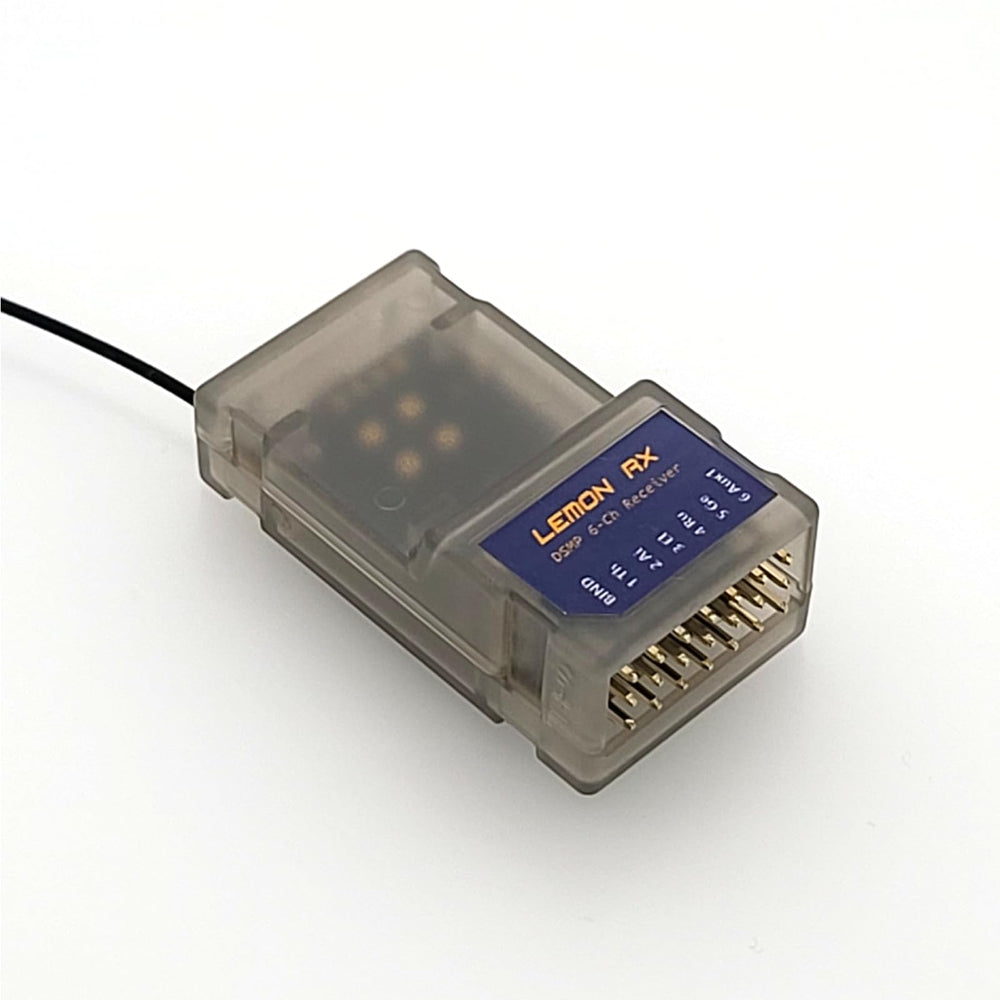 Buddy RC DSMP 6-CH receiver exterior with sturdy build for reliable flights.