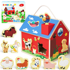 BUMBELIN wooden barn shape sorter with open roof for easy access during play.