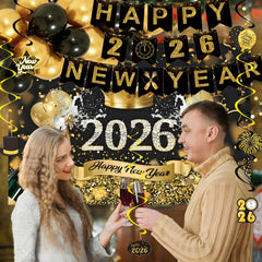 Butiomom 2026 cards and hanging swirls brighten the party setup.