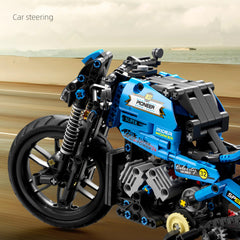 CAEROKEERL motorcycle model with removable tires for interactive building.