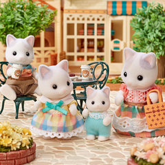 Calico Critters Latte Cat Mother figure in colorful checkered outfit for role-play