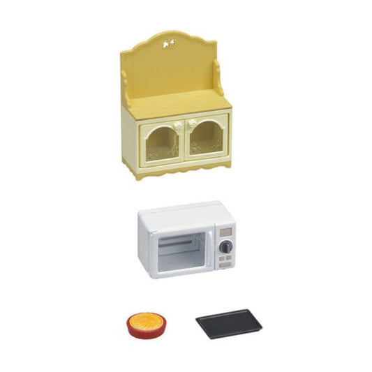 Calico Critters microwave cabinet in a dollhouse with organized storage and realistic detail.