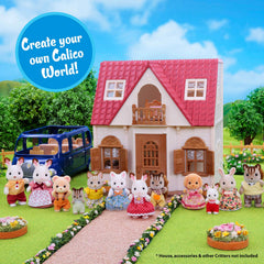 Calico Critters Persian Cat figures with removable clothing for dress-up fun.
