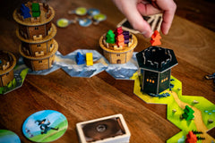 Capstone Wandering Towers landscape tiles set the board's mood.