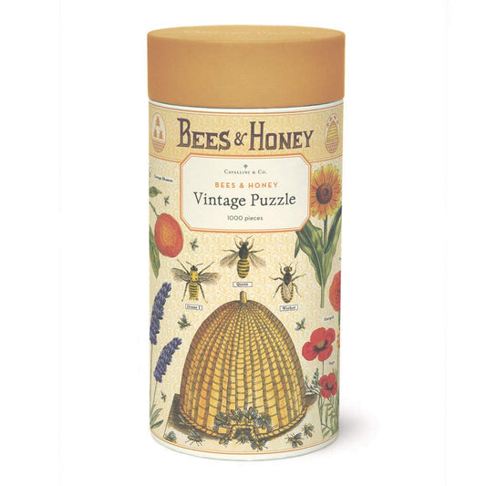 Cavallini Bees and Honey puzzle in vintage packaging tube, ideal for gifting and display.