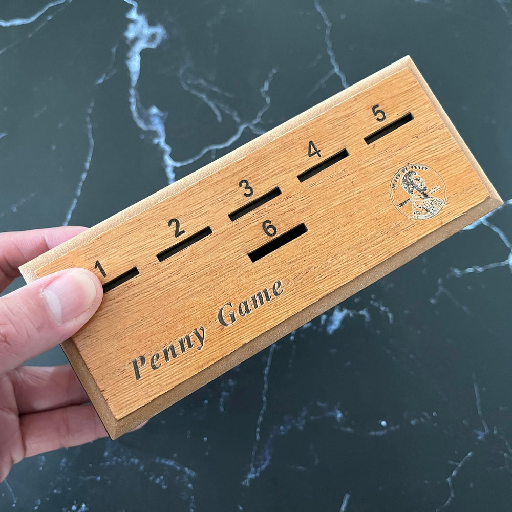 CBLKUS Penny Game coins and dice close-up, easy setup in minutes