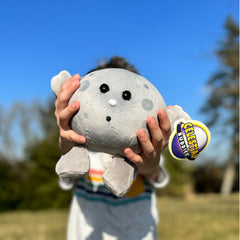 Celestial Buddies Moon Buddy safety label indicating toy-safe for ages 0 plus.