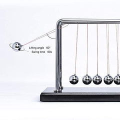 CERROPI Newton cradle on a clean desk offers tactile stress-relief during work.