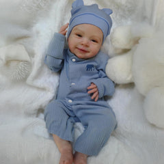 CHAREX Reborn Baby Boy accessories include bottle and pacifier for interactive play.