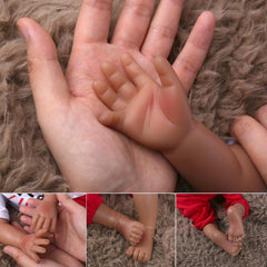 CHAREX Reborn black doll with rooted hair for natural styling.