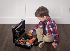 Office-imagination scene with Child Executive Officer dress-up briefcase