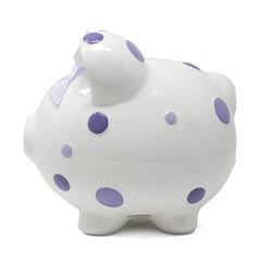 Child to Cherish piggy bank includes a removable stopper for coin retrieval.