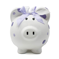 Child to Cherish piggy bank with purple polka dots for nursery decor and saving.