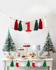 CIEQR One-year birthday decor banner creates a playful focal point.