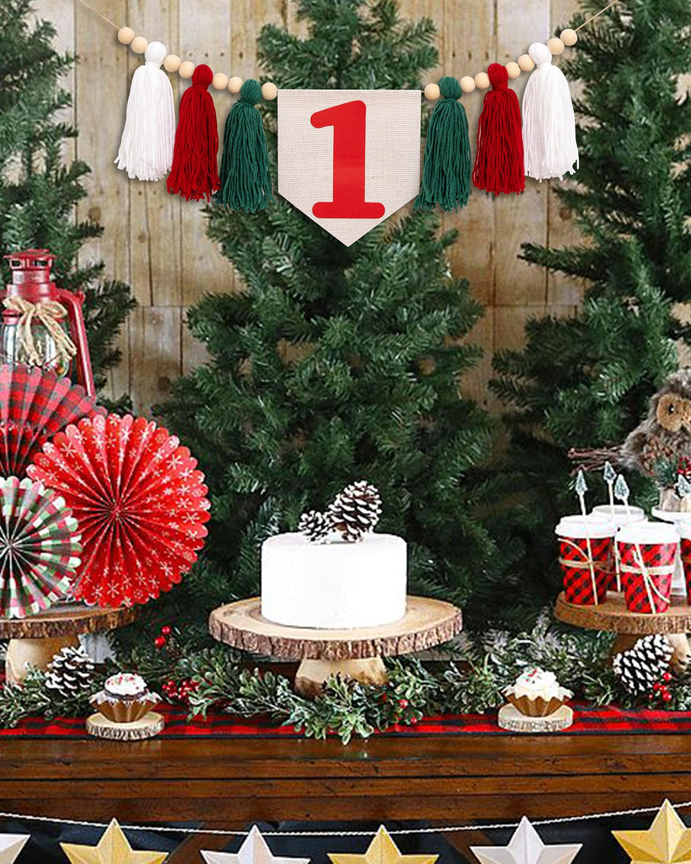 CIEQR Red and green tassel banner enhances holiday themed cake smash moments.
