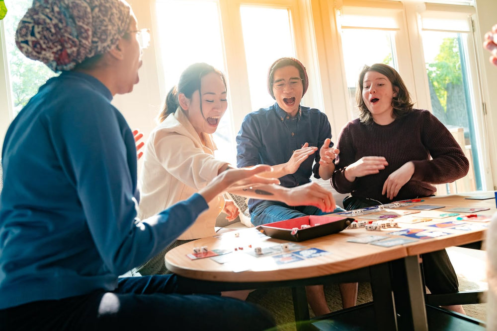 CMYK Spots Dice Game: easy pickup with 5-minute learning for 2-4 players.
