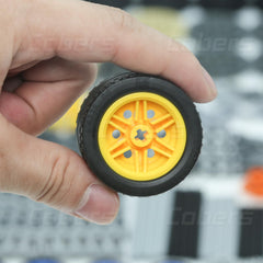 Cobers Technic shock absorbers reducing jolts in motorized models