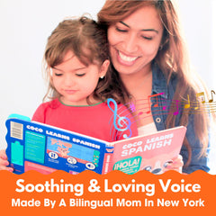Child using Coco Learns Spanish musical toy in a cozy living room.