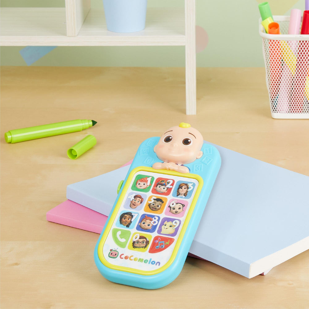 CoComelon phone plays Wheels on the Bus and BINGO to encourage singing along