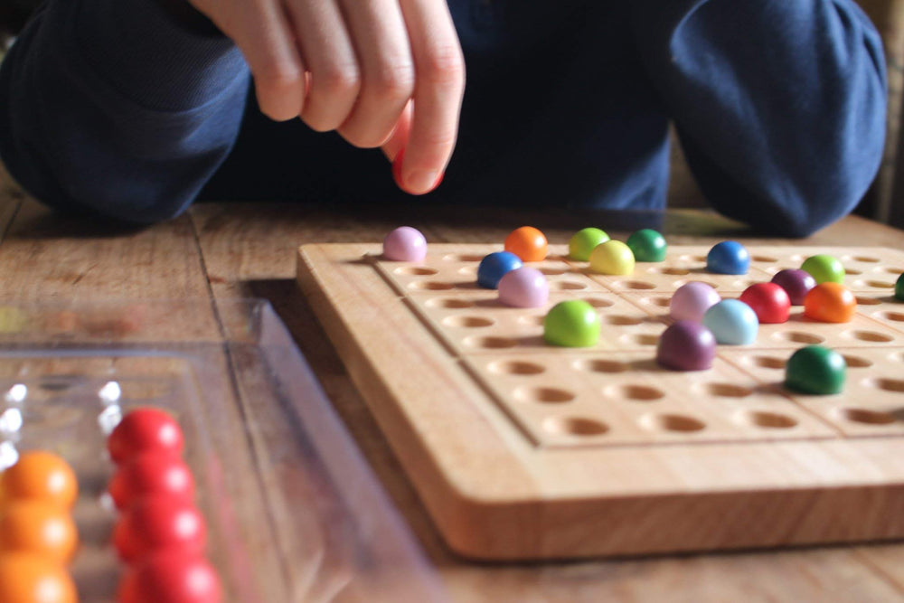 ColorKu puzzle card holder keeps cards organized during play.