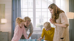 Conclave ICECOOL family game night captures group interaction and shared laughter.