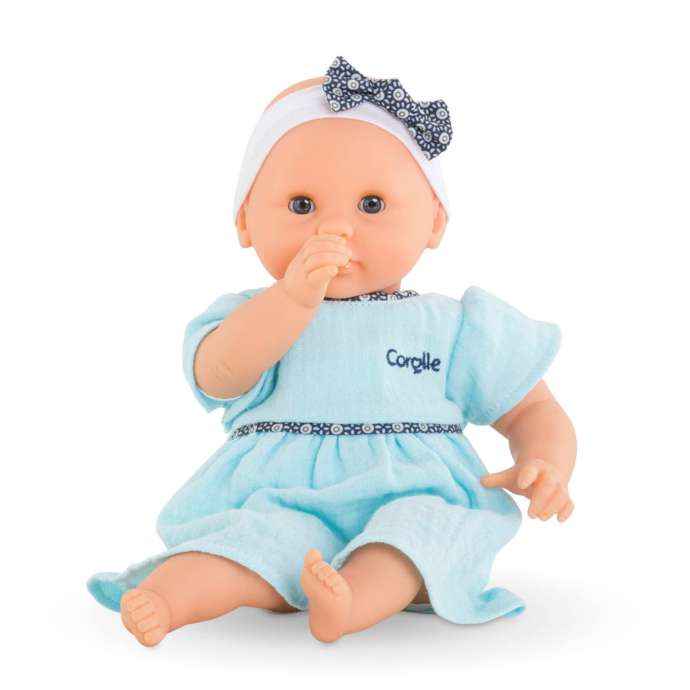 Corolle Bébé Calin Maud bean-filled body supports lifelike posing.