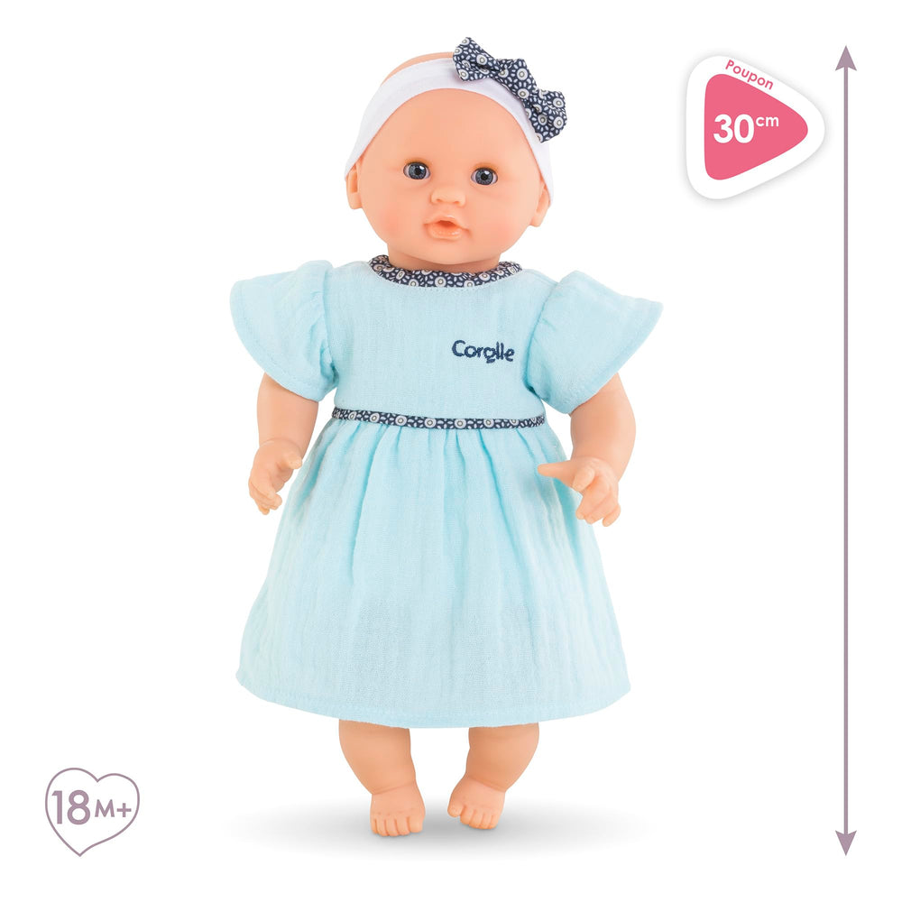 Corolle Bébé Calin Maud face close-up highlights lifelike features.